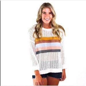 Air White Sweater has five stripes of color
